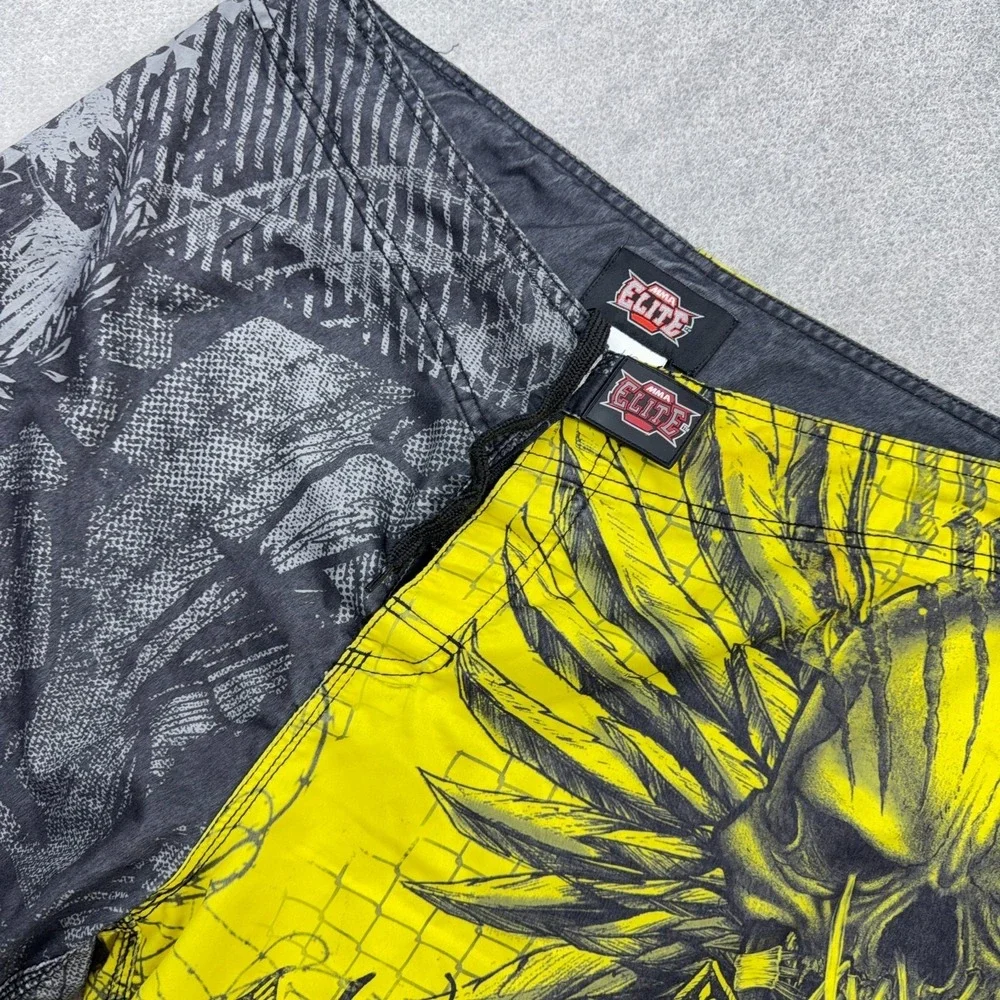 MMA Elite Board Shorts Men Large Yellow Gray Swim Trunks Skull Wings AOP Y2K